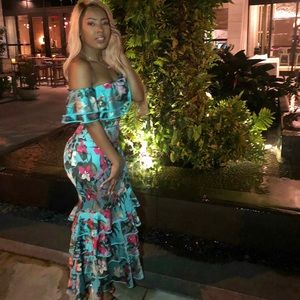 Two piece satin off shoulder top and high waisted skirt. No stretch